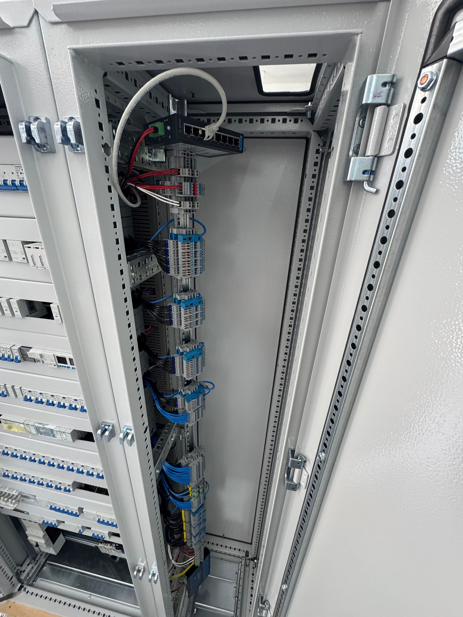 Control cabinet with HMI and protective devices